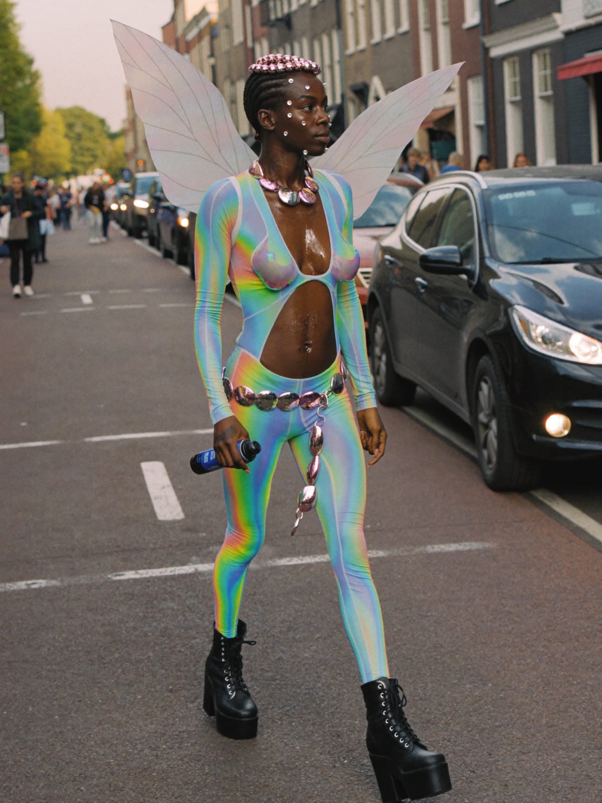 Cyber Fairy outfit for Amsterdam Dance Event: holographic bodysuit, fairy wings or light-up halo, platform boots