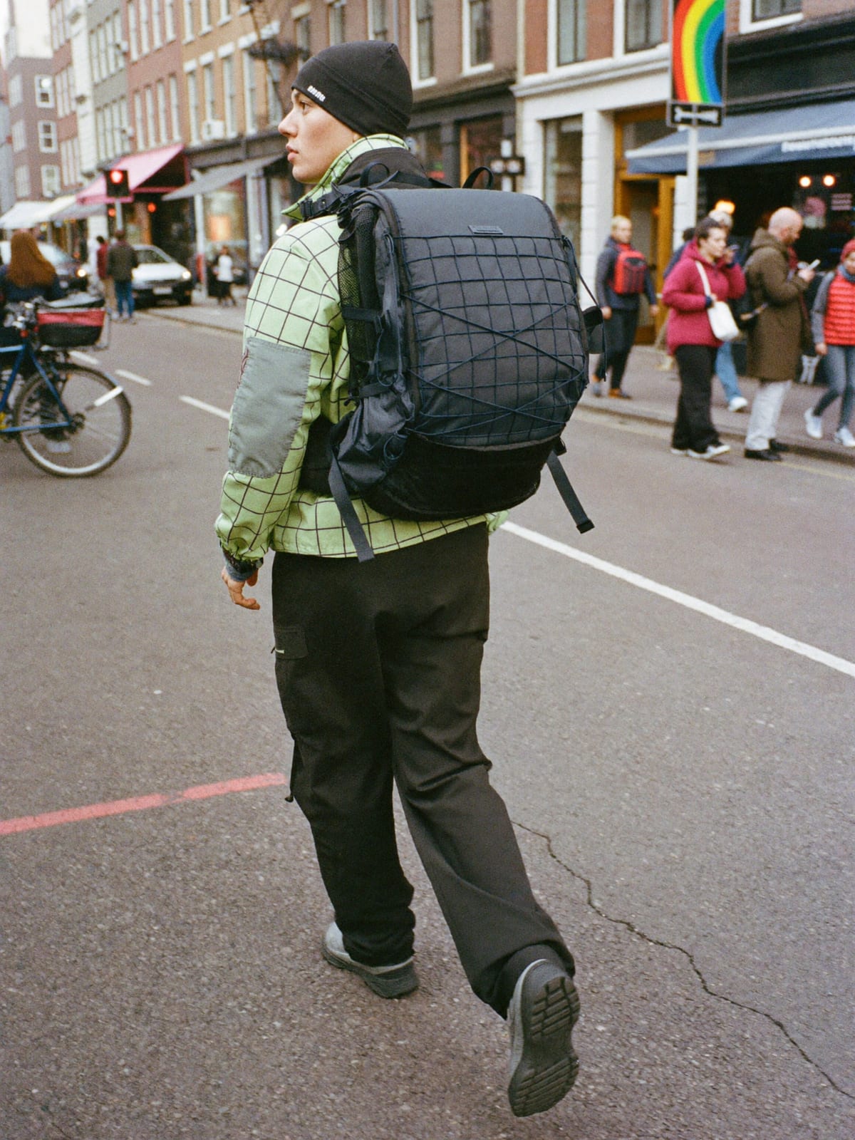 Gorpcore Utility outfit for Amsterdam Dance Event: technical waterproof shell, utility trousers, trail runners