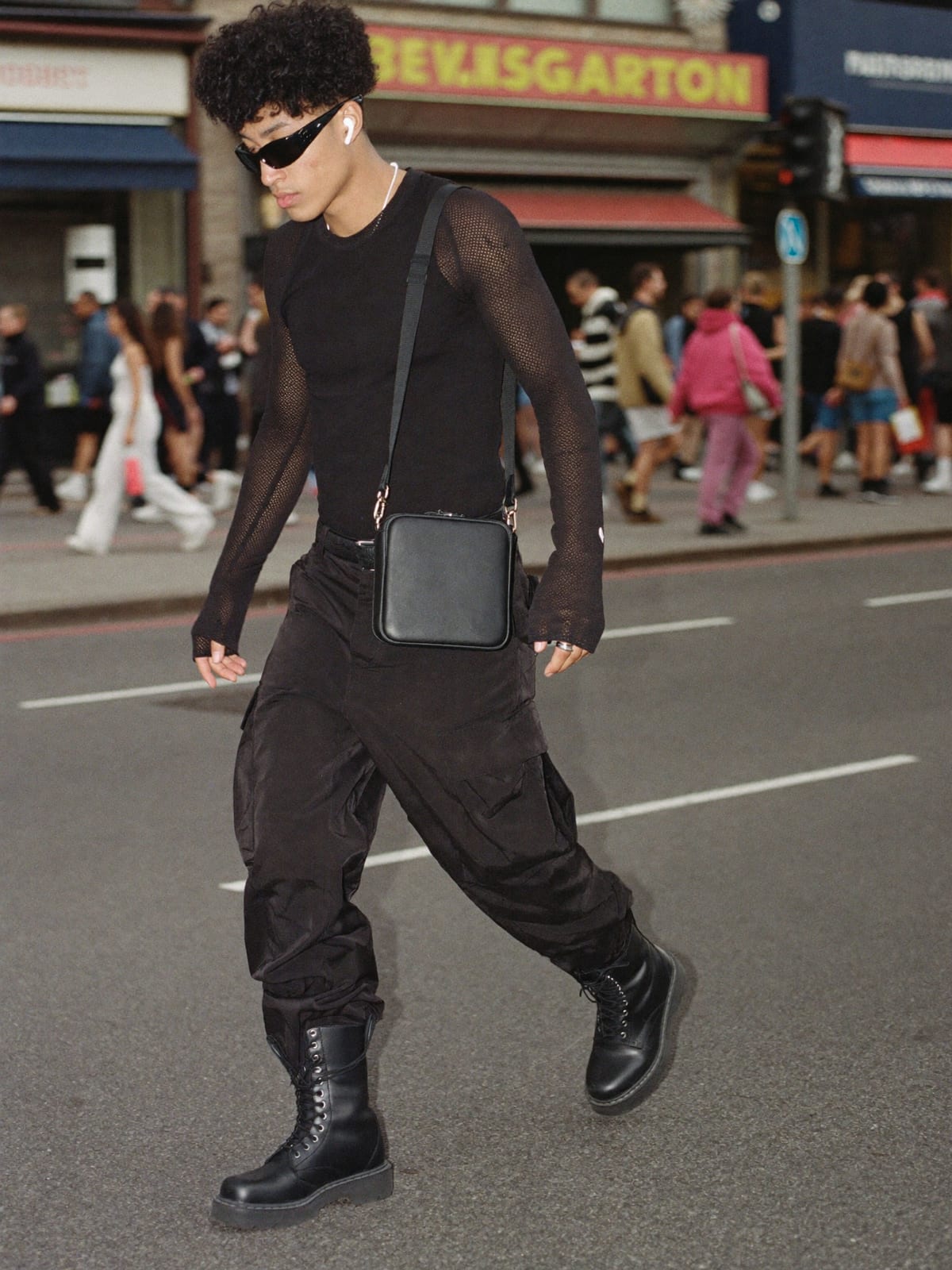 All-Black Techno outfit for Amsterdam Dance Event: black tank or mesh long sleeve, black cargo trousers, black combat boots
