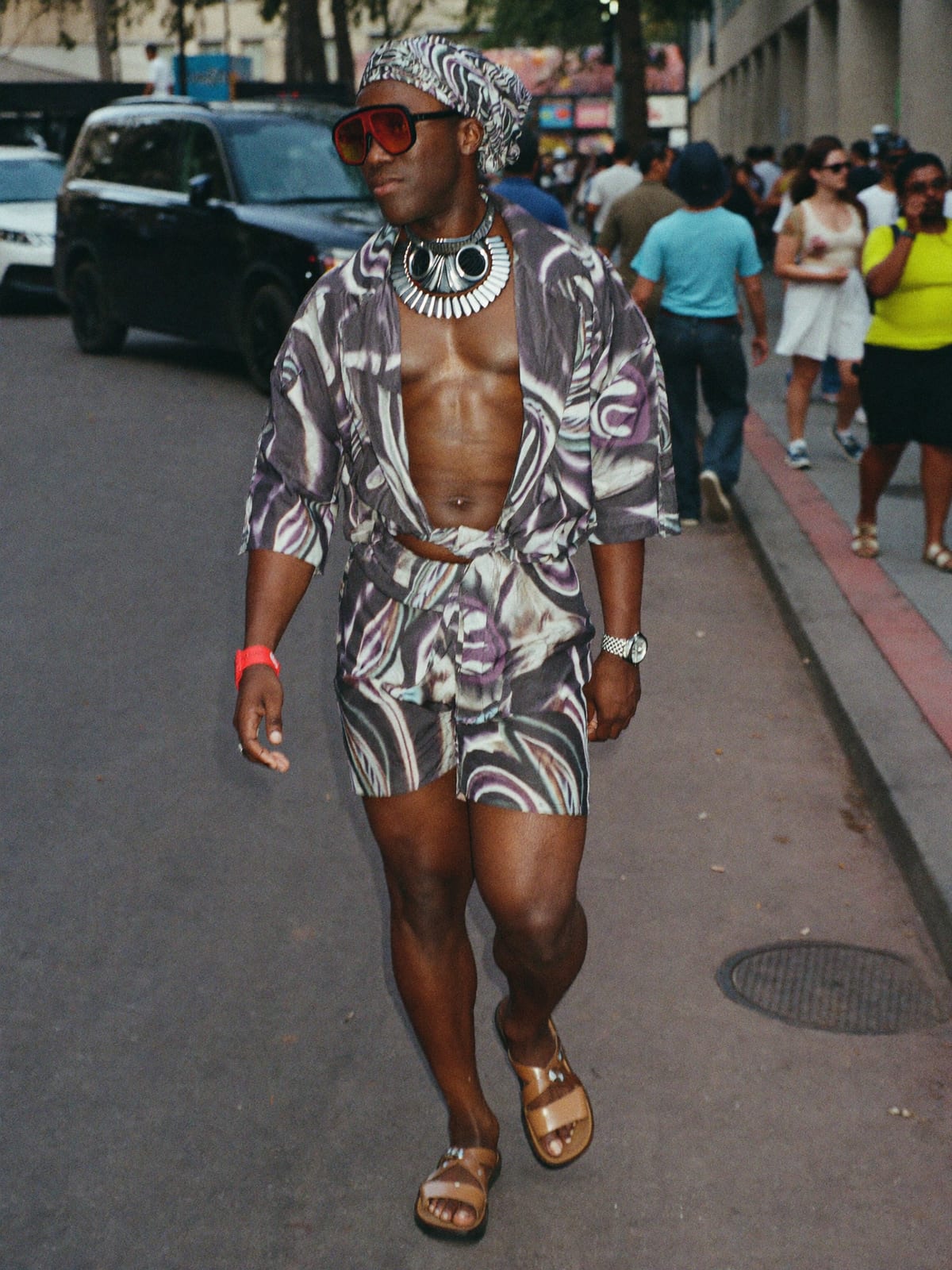 Afro Print Statement outfit for Barranquilla Carnival: printed co-ord set, open shirt or wrap top, leather sandals or slides