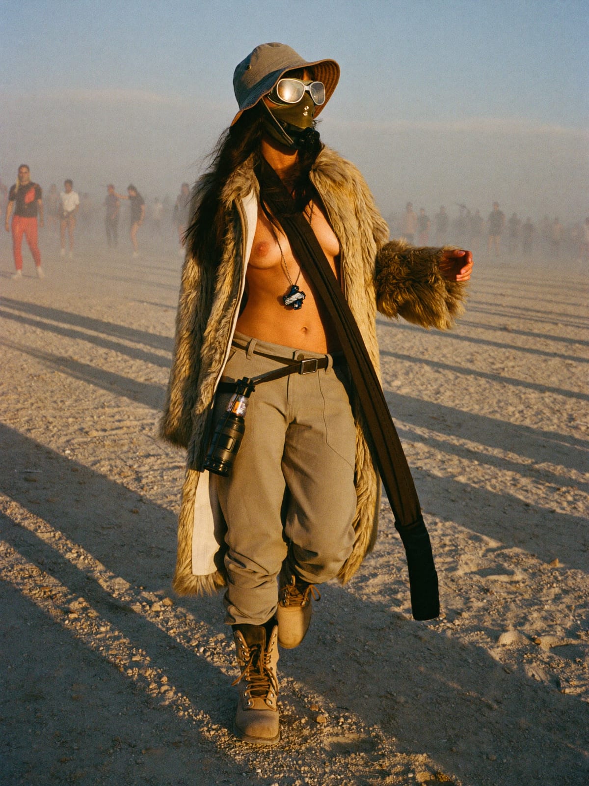 Dust-Proof Playa outfit for Burning Man: expressive layered costume, dust goggles, faux fur or utility coat for the night