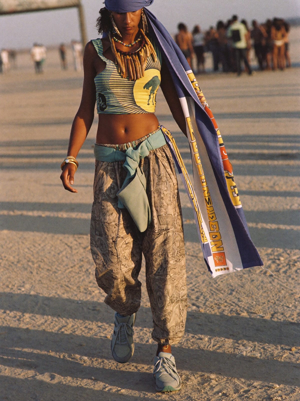 Psy Tribal outfit for Burning Man: harem or parachute trousers, UV-print vest or wrap top, lightweight trail trainers
