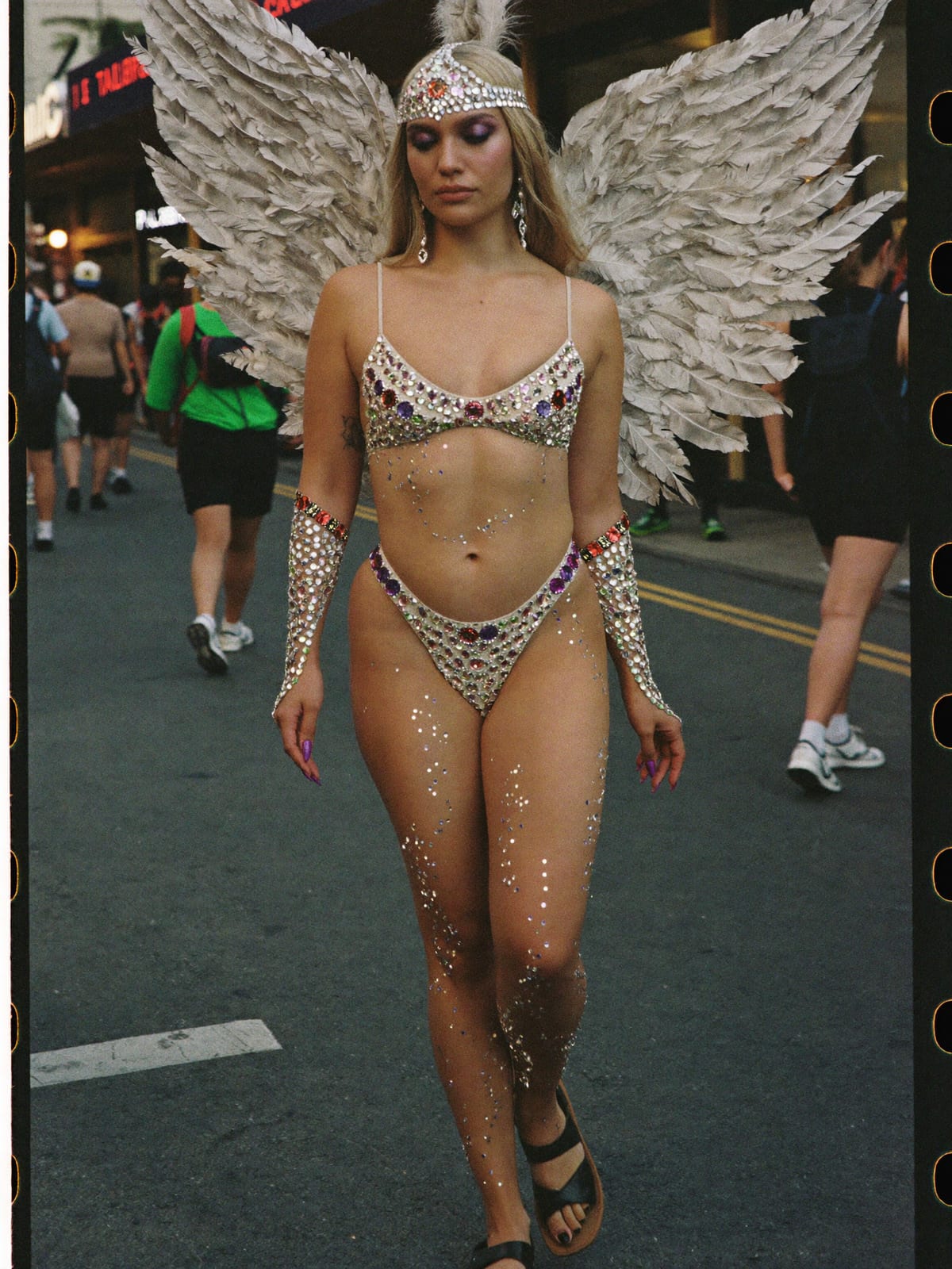 Carnival Feathers outfit for Calgary Stampede: feather headpiece and wings, sequin bodysuit, body gems and glitter