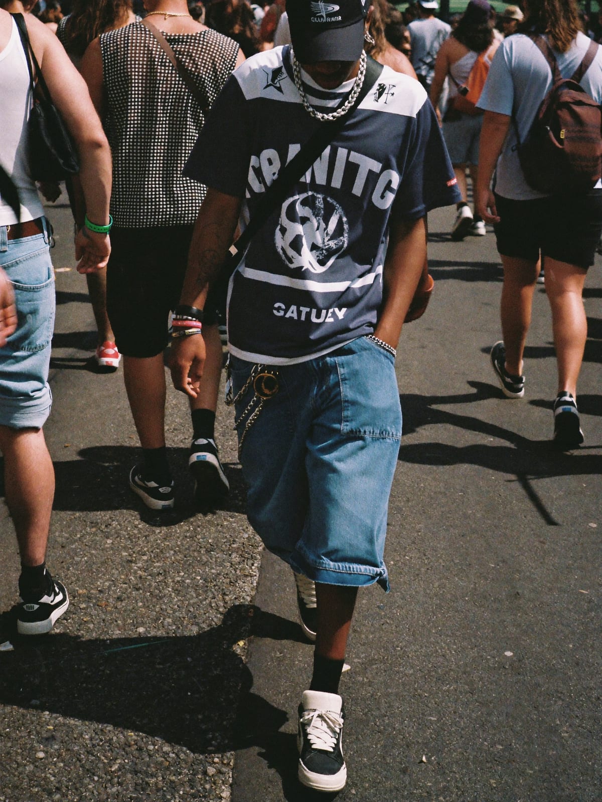 Street Heat outfit for Calgary Stampede: oversized graphic tee or jersey, baggy denim or cargo shorts, statement sneakers