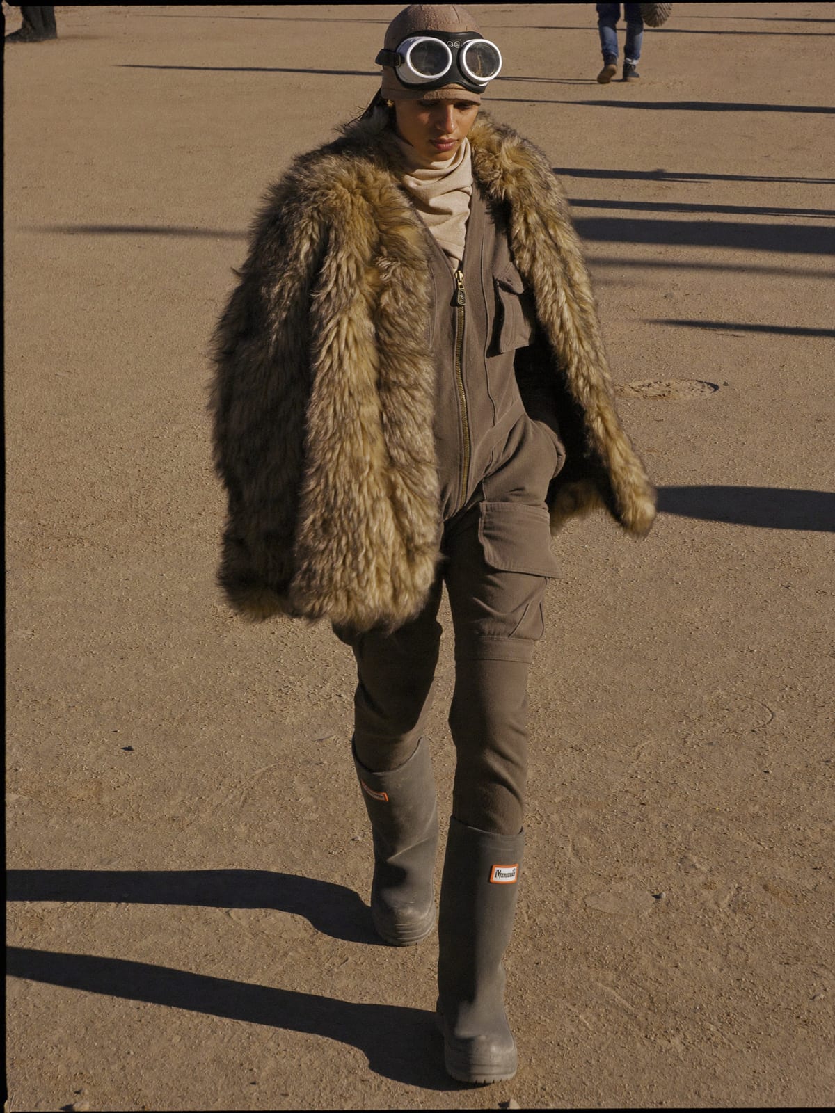 Dust-Proof Playa outfit for Coachella: expressive layered costume, dust goggles, faux fur or utility coat for the night