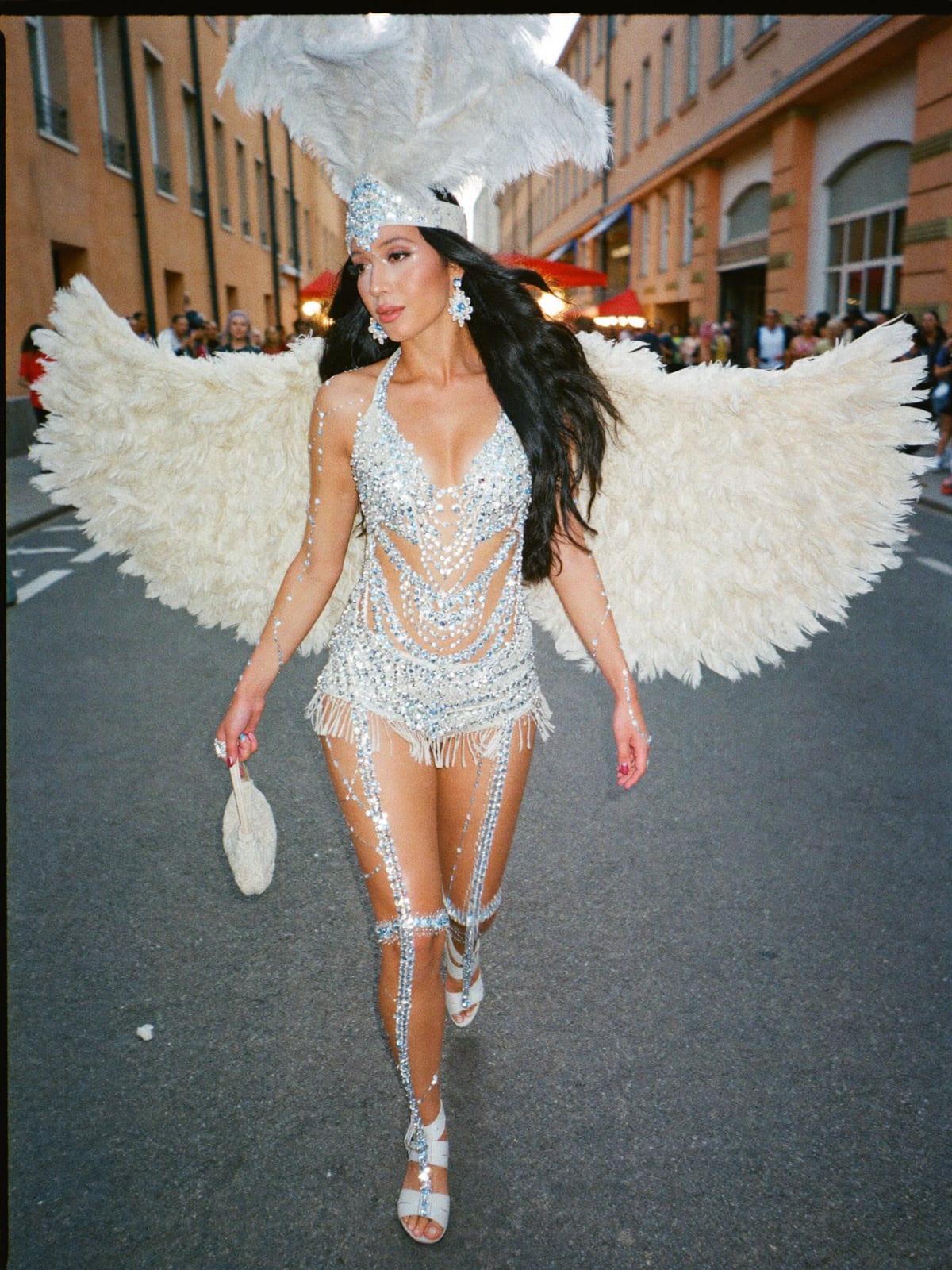 Carnival Feathers outfit for Cologne Carnival: feather headpiece and wings, sequin bodysuit, body gems and glitter