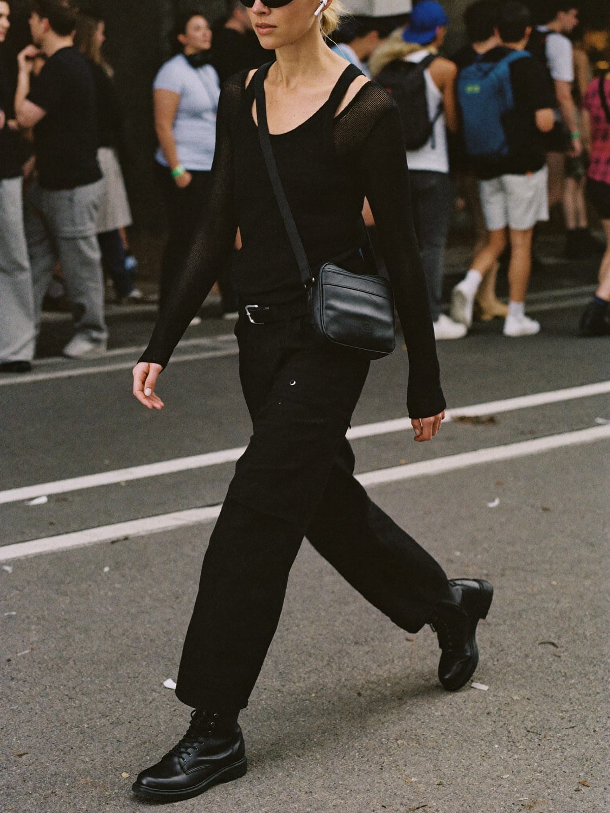 All-Black Techno outfit for Cologne Carnival: black tank or mesh long sleeve, black cargo trousers, black combat boots