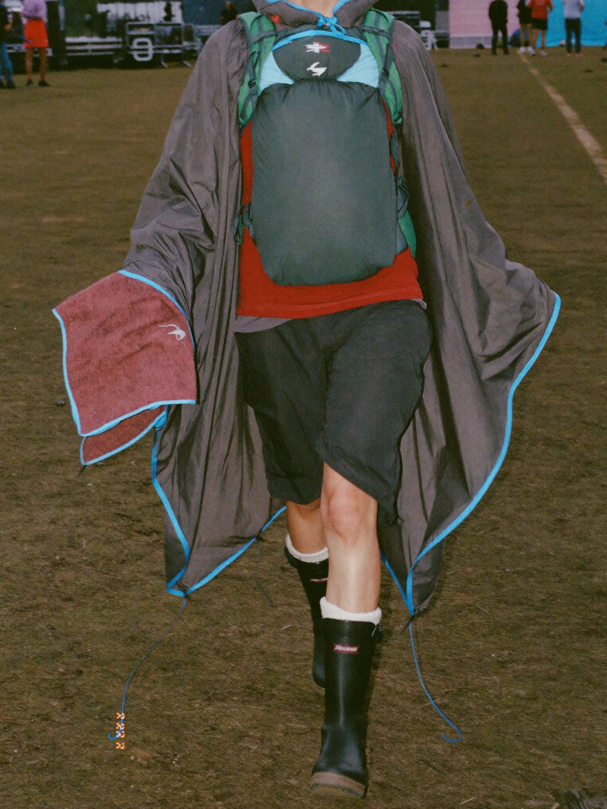 Mud-Proof Practical outfit for Creamfields: waterproof poncho, wellington boots with thick socks, fleece mid-layer