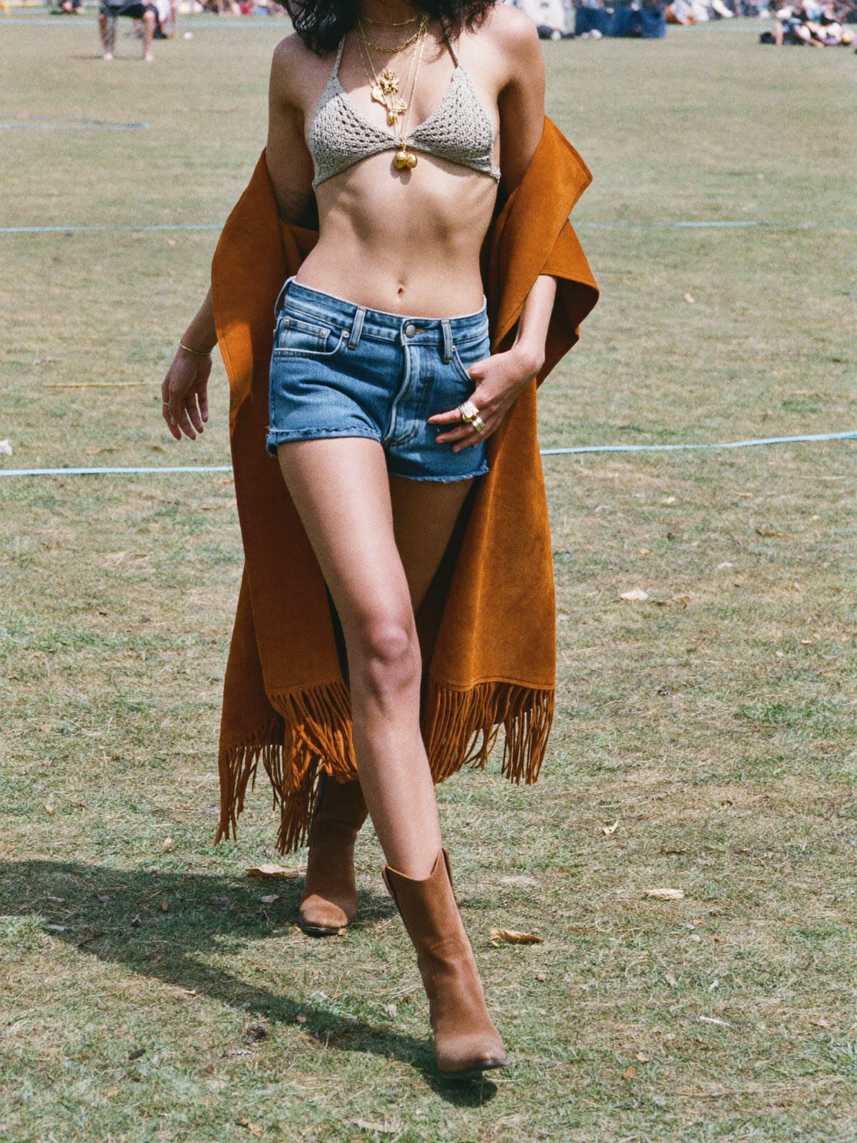 Desert Boho outfit for Electric Castle: crochet halter or bralette, high-rise denim cut-offs, fringed suede or kimono layer