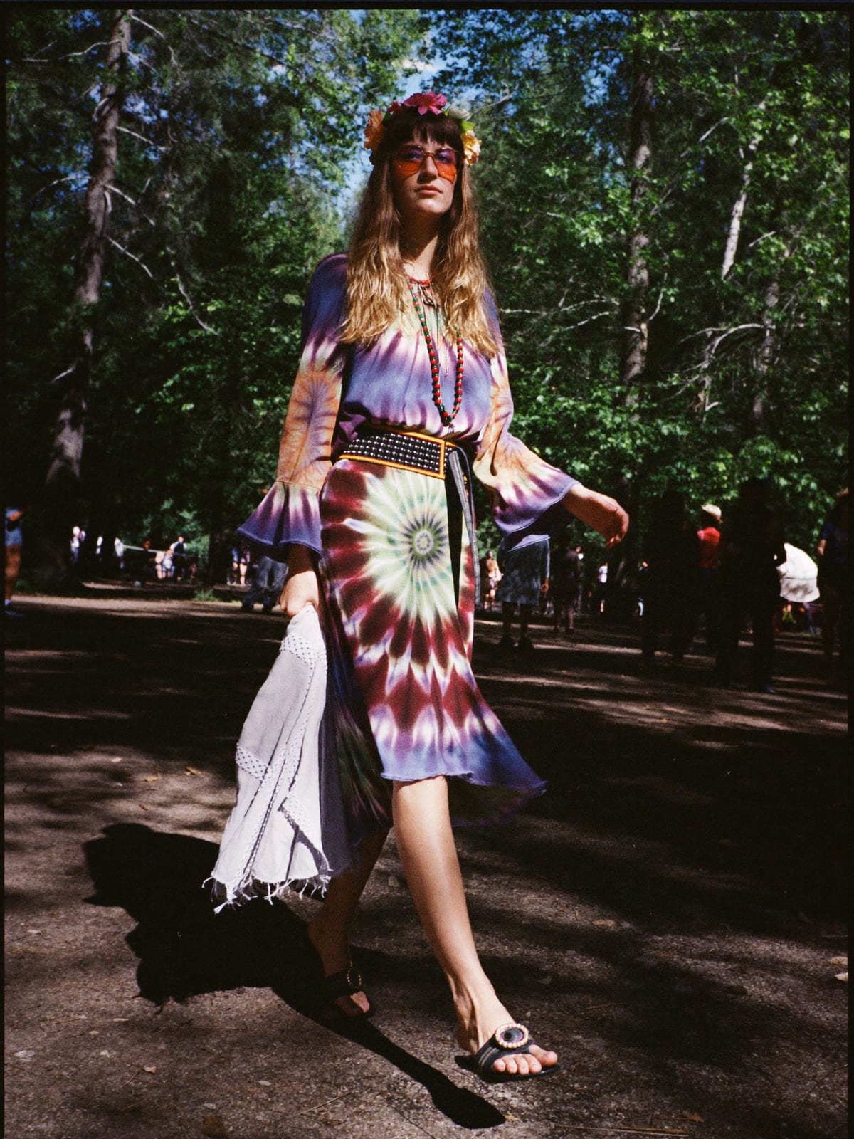 Flower Power outfit for Electric Forest: tie-dye or paisley maxi, bell-sleeve blouse, flat leather sandals