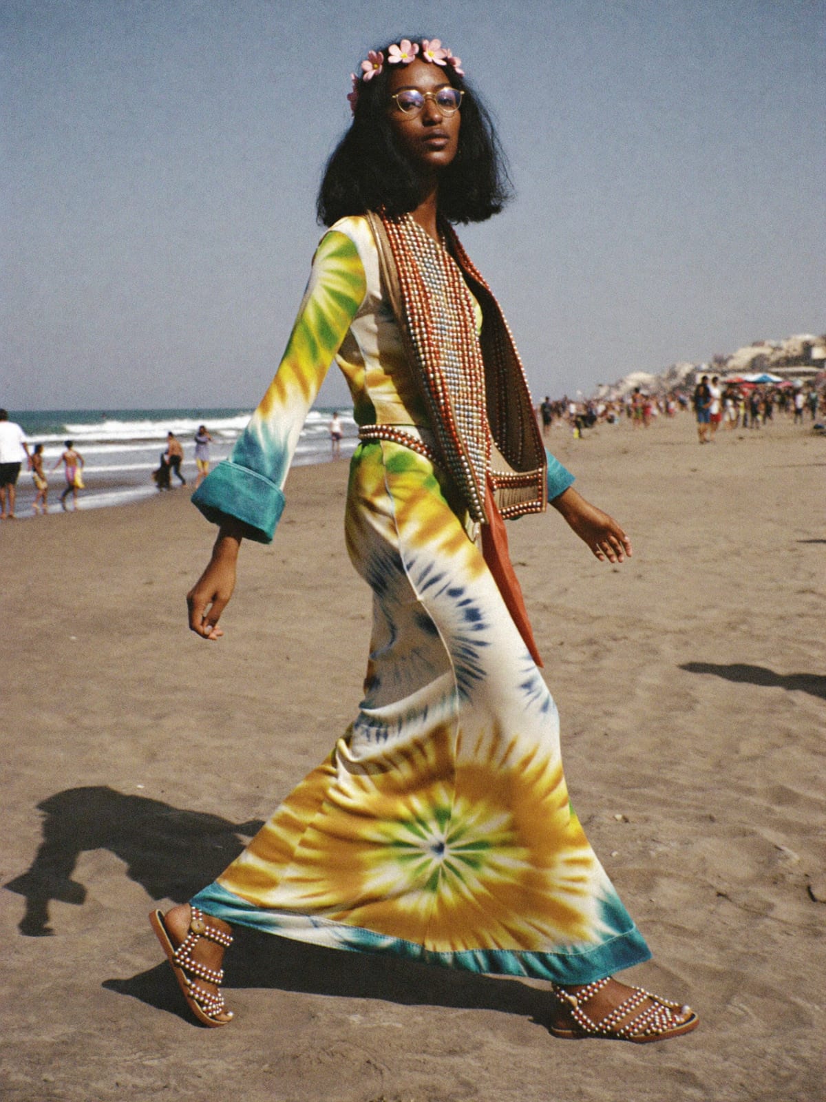 Flower Power outfit for Gnaoua World Music Festival: tie-dye or paisley maxi, bell-sleeve blouse, flat leather sandals