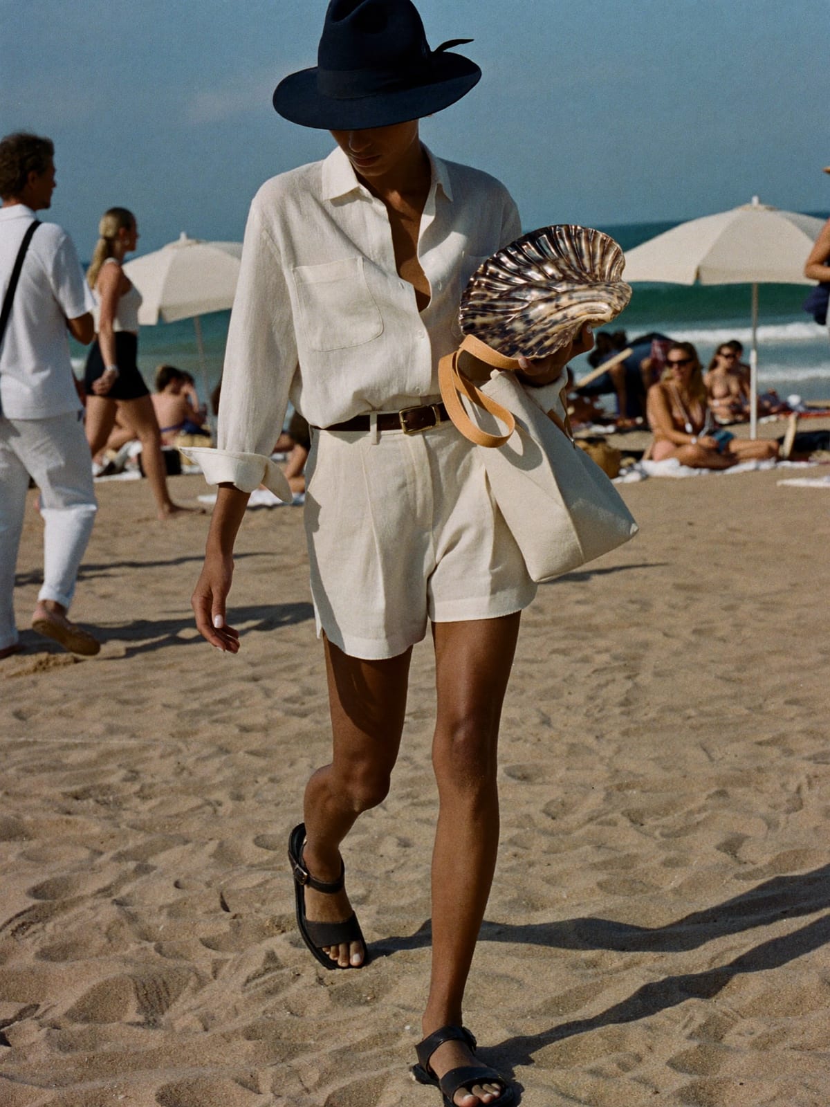 Linen Minimal outfit for Gnaoua World Music Festival: linen camp-collar shirt, tailored linen shorts, leather sandals