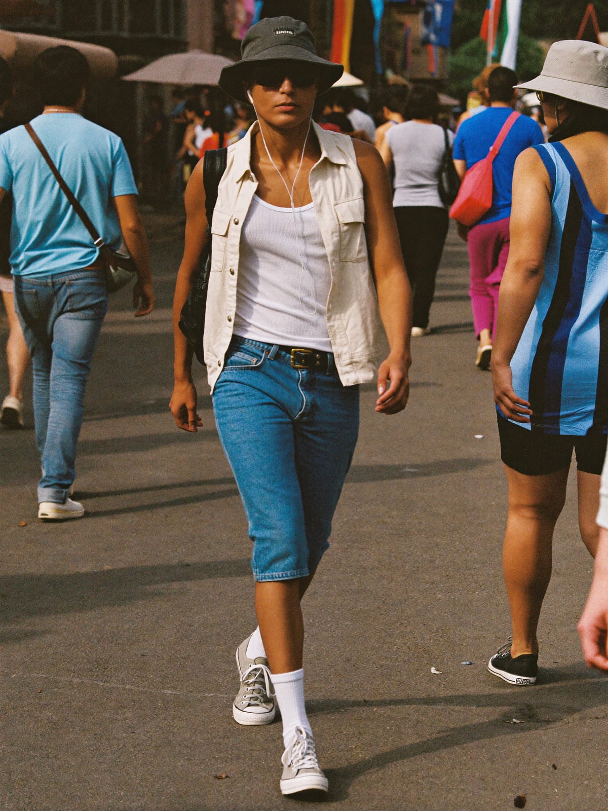 Jorts & Tank outfit for Holi in Mathura: denim jorts, ribbed tank or open camp shirt, canvas or retro runners