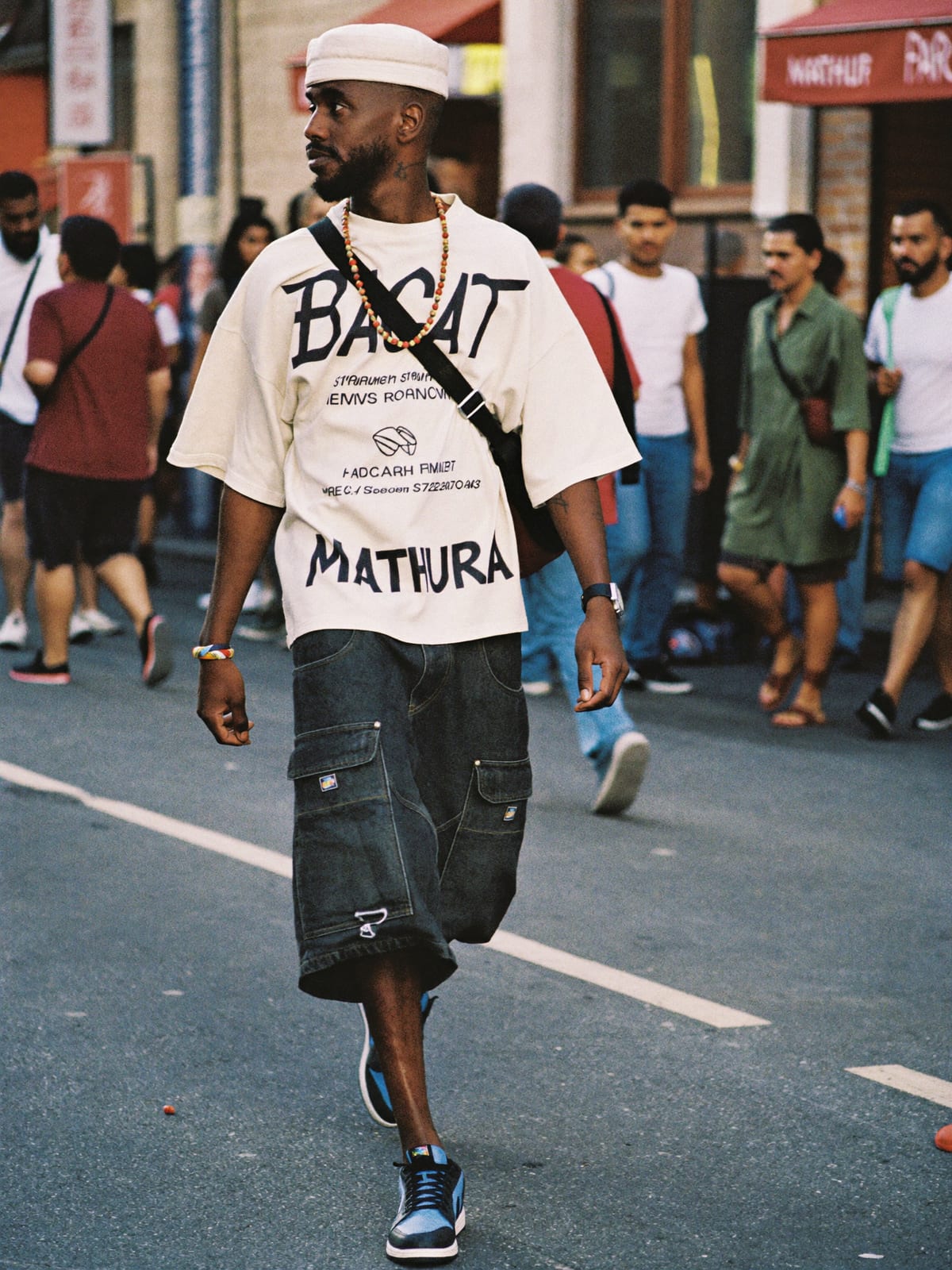 Street Heat outfit for Holi in Mathura: oversized graphic tee or jersey, baggy denim or cargo shorts, statement sneakers