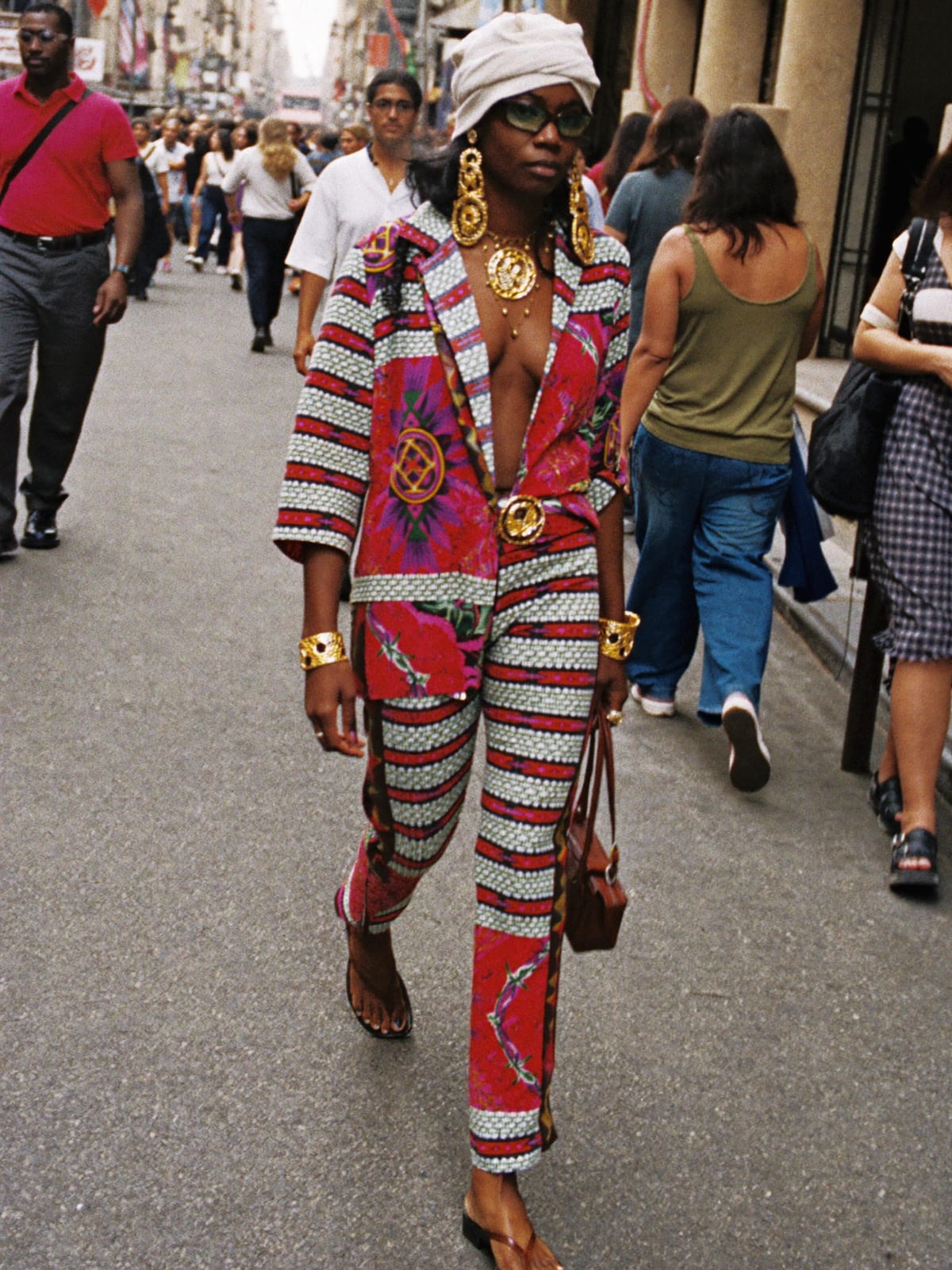 Afro Print Statement outfit for Las Fallas: printed co-ord set, open shirt or wrap top, leather sandals or slides