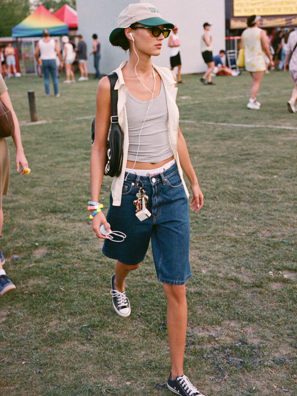 Jorts & Tank outfit for Lollapalooza: denim jorts, ribbed tank or open camp shirt, canvas or retro runners