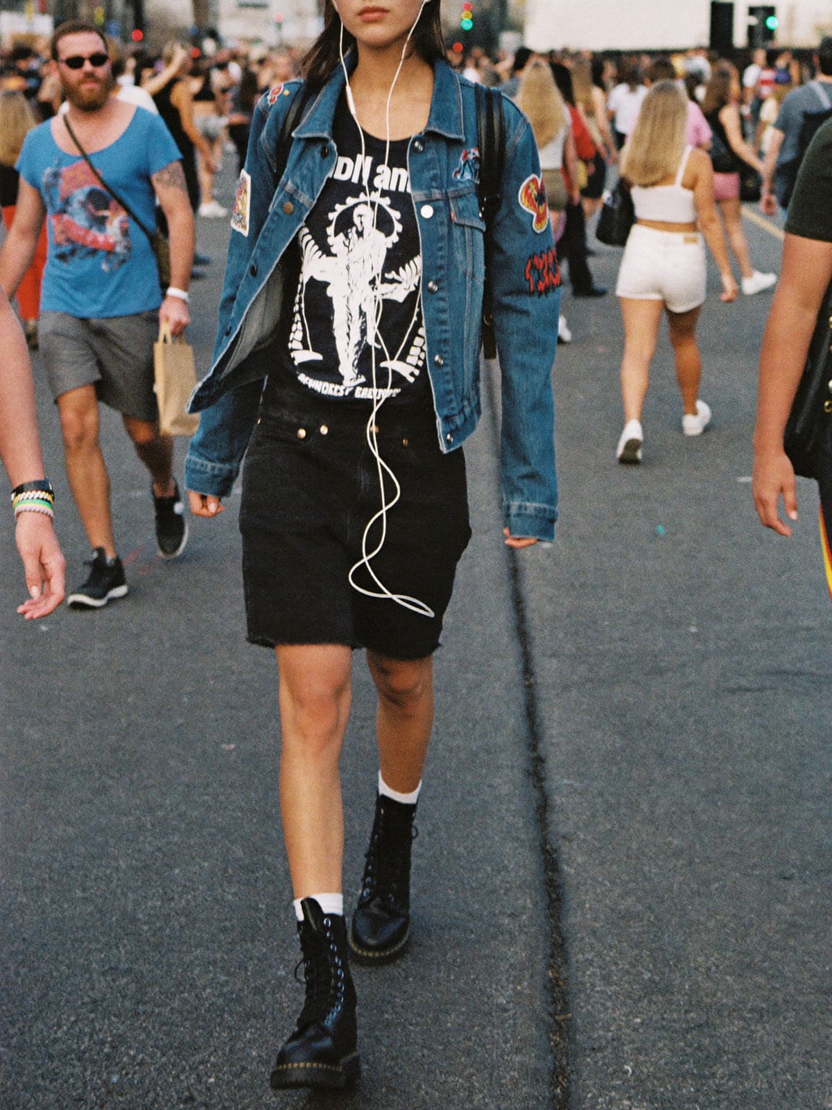 Metal Uniform outfit for Mardi Gras New Orleans: black band tee, denim battle jacket with patches, black jeans or shorts