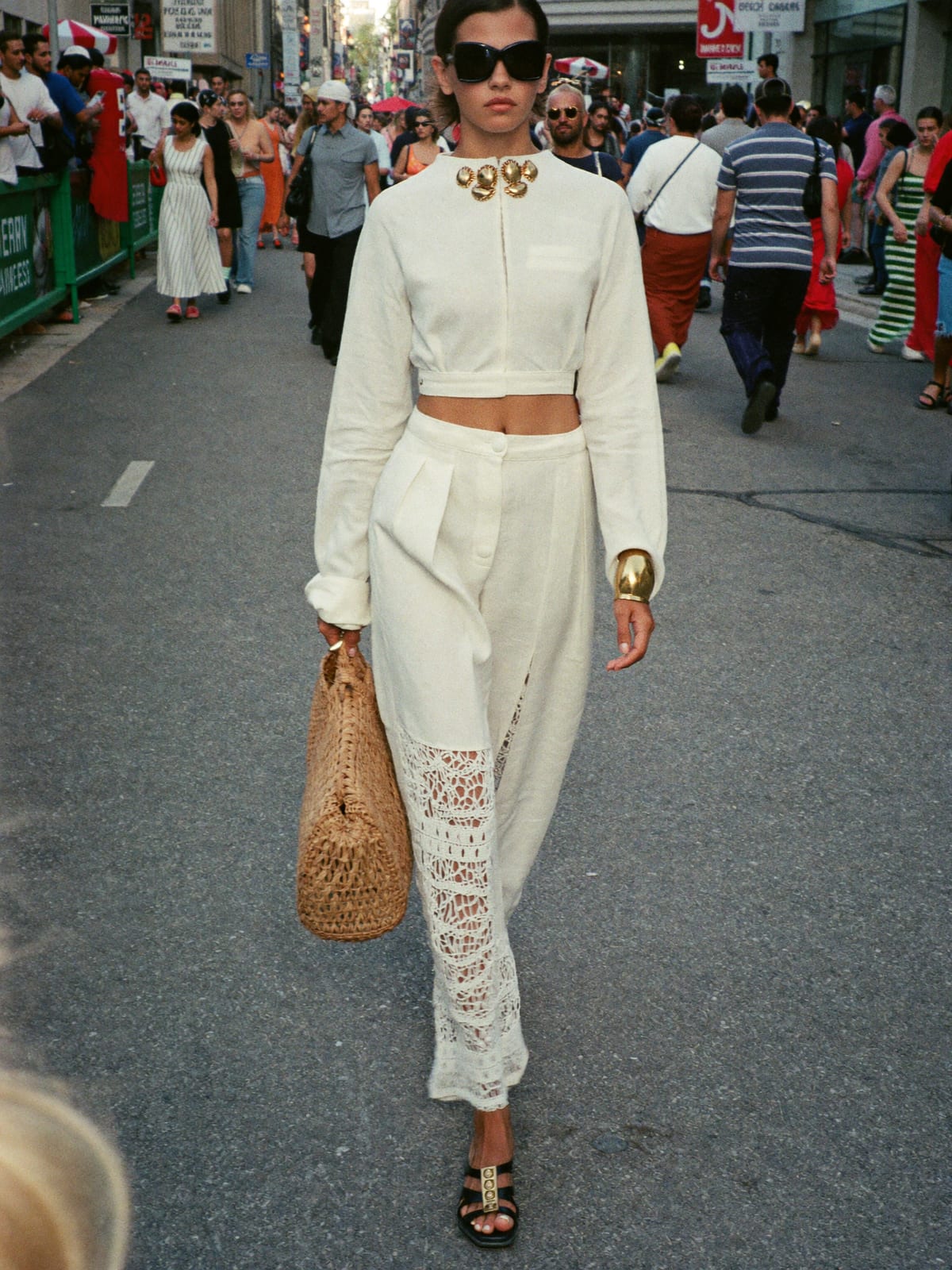 All-White outfit for Mardi Gras New Orleans: white linen co-ord, white crochet or cut-out dress, leather sandals
