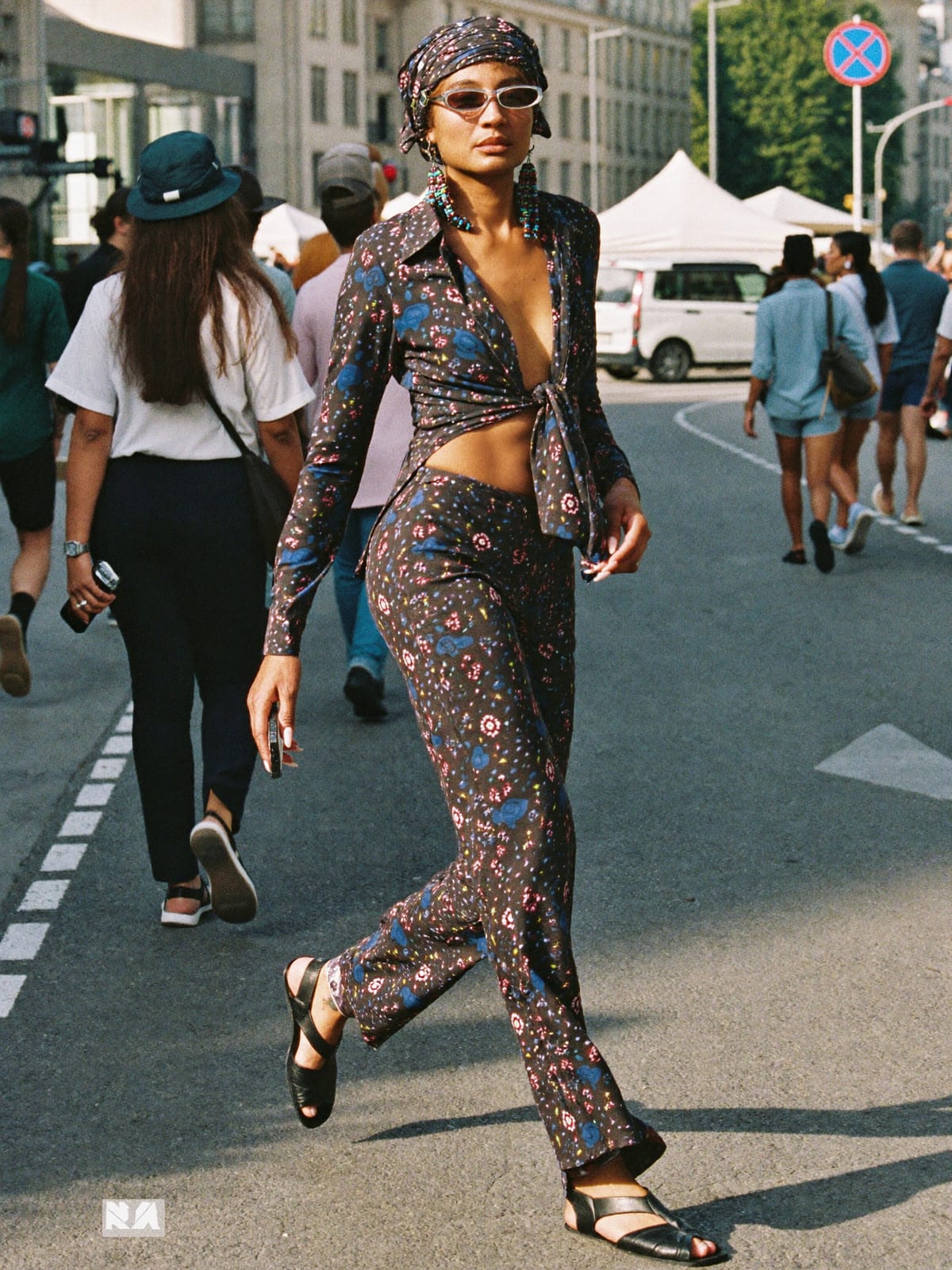 Afro Print Statement outfit for Montreux Jazz Festival: printed co-ord set, open shirt or wrap top, leather sandals or slides