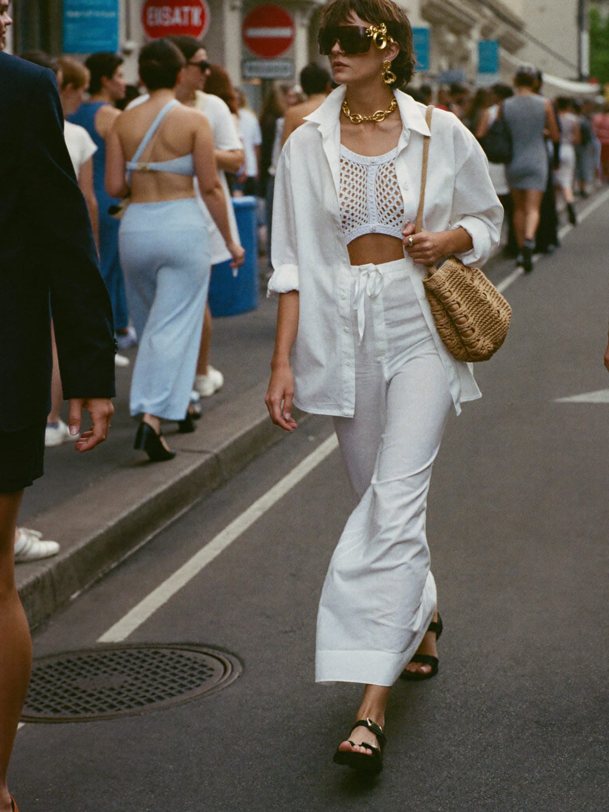 All-White outfit for Oktoberfest: white linen co-ord, white crochet or cut-out dress, leather sandals
