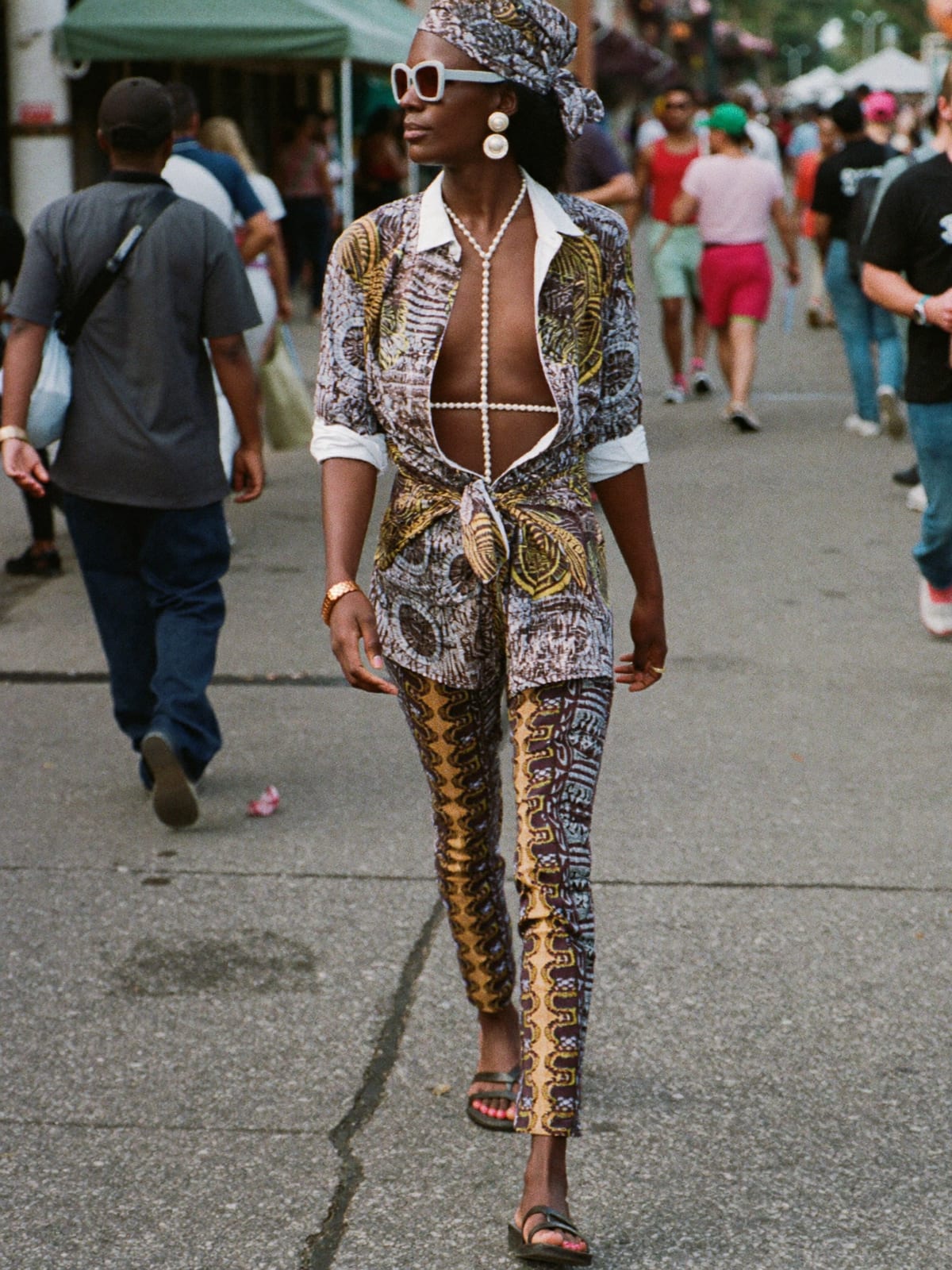 Afro Print Statement outfit for Rio Carnival: printed co-ord set, open shirt or wrap top, leather sandals or slides