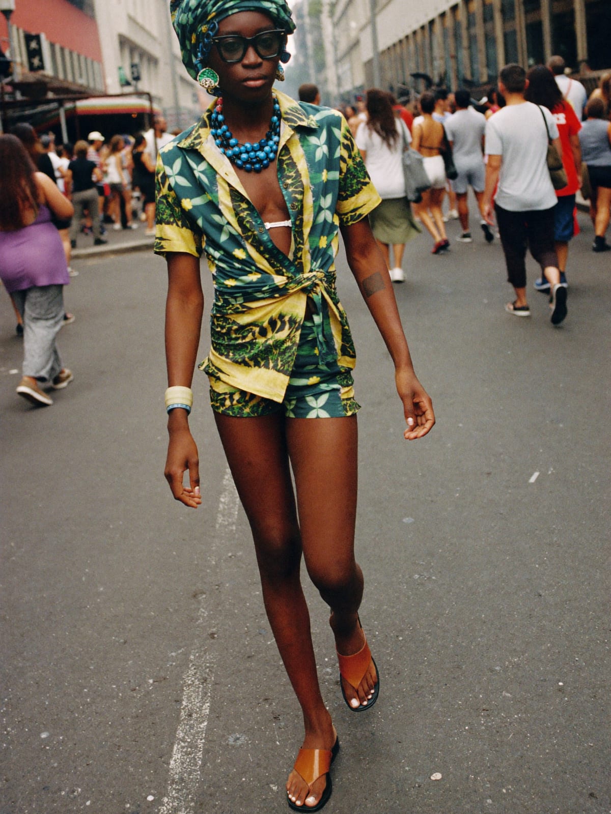 Afro Print Statement outfit for Salvador Carnival: printed co-ord set, open shirt or wrap top, leather sandals or slides