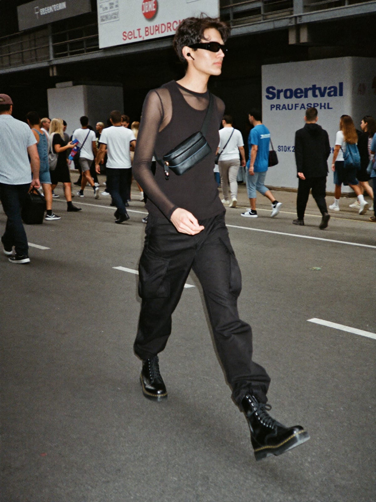 All-Black Techno outfit for Salvador Carnival: black tank or mesh long sleeve, black cargo trousers, black combat boots