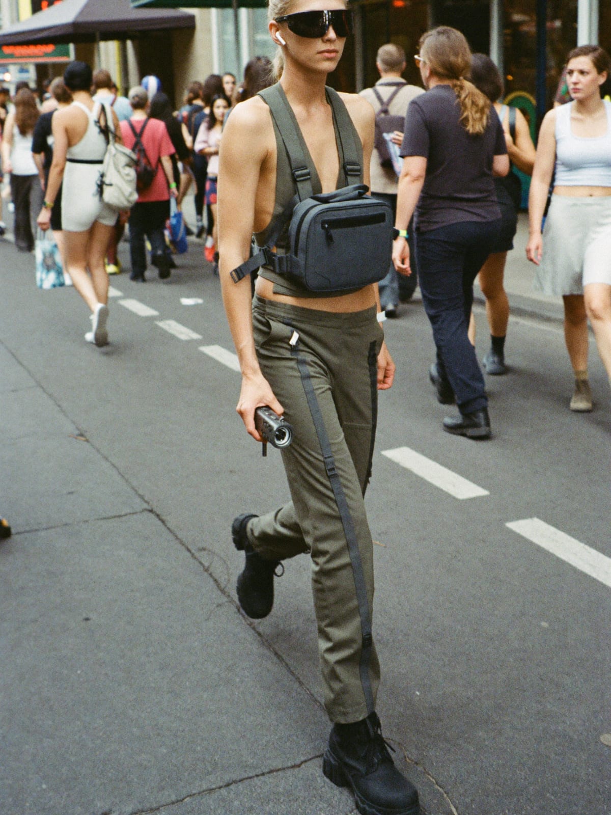 Cyberpunk Utility outfit for San Fermín: technical vest or shell, strap cargo trousers, tactical boots