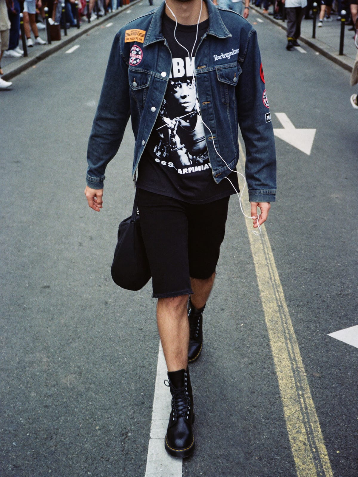 Metal Uniform outfit for San Fermín: black band tee, denim battle jacket with patches, black jeans or shorts