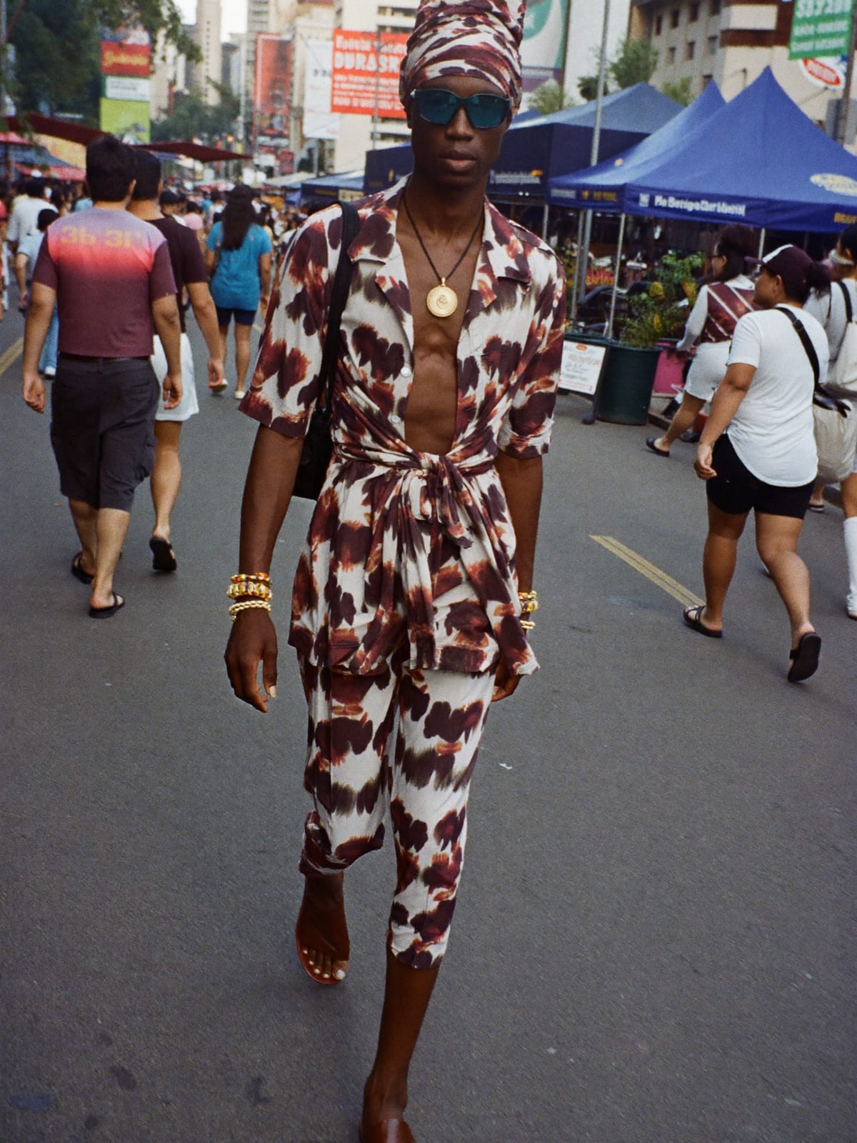 Afro Print Statement outfit for Songkran Bangkok: printed co-ord set, open shirt or wrap top, leather sandals or slides