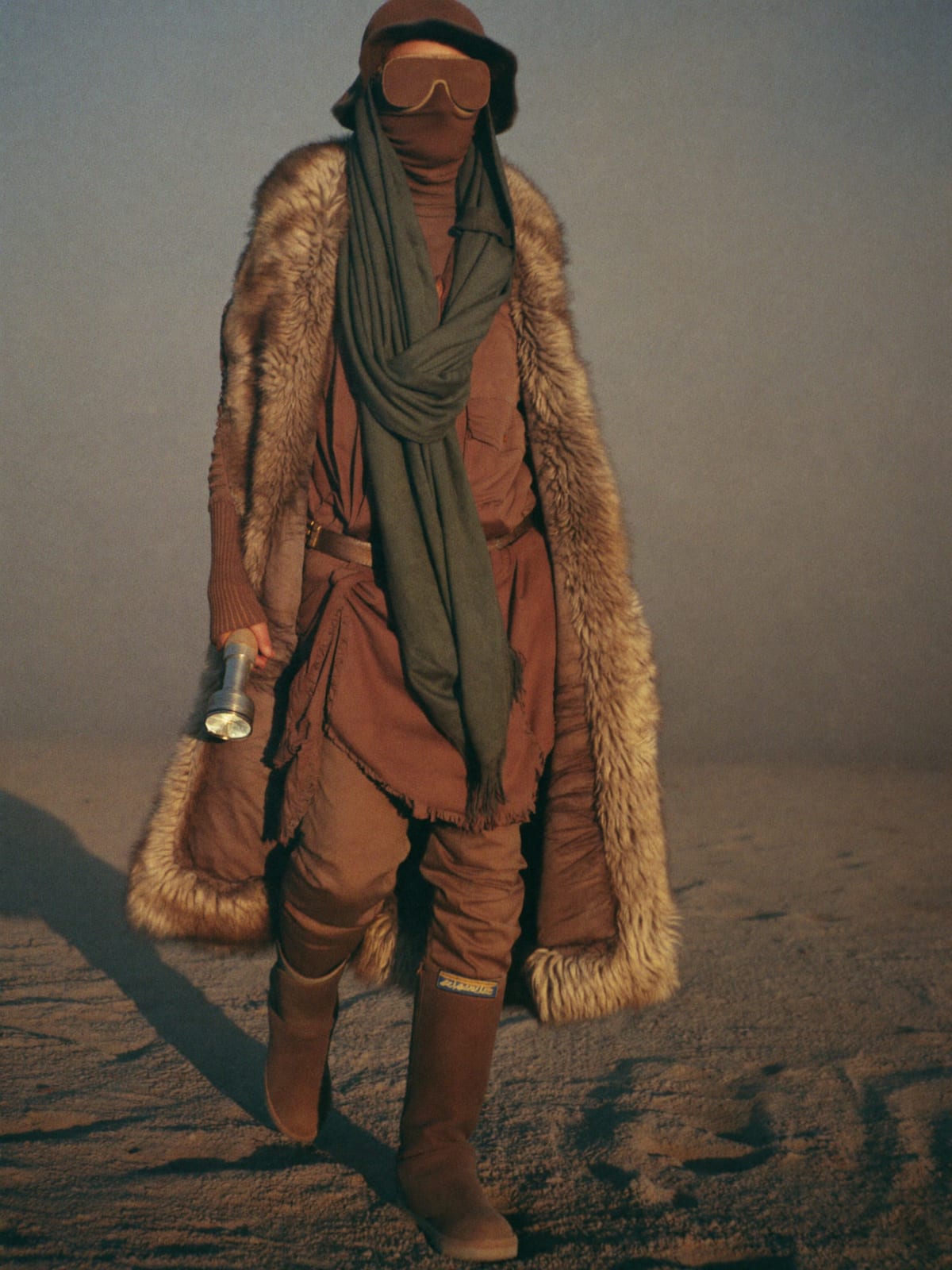 Dust-Proof Playa outfit for MDLBEAST Soundstorm: expressive layered costume, dust goggles, faux fur or utility coat for the night