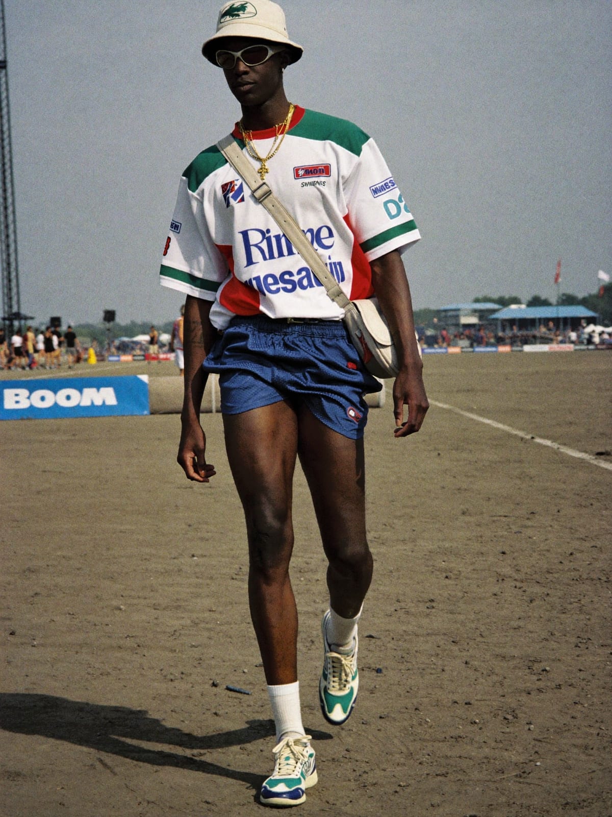 Jersey Core outfit for Tomorrowland: retro football or racing jersey, mesh or nylon shorts, terrace trainers