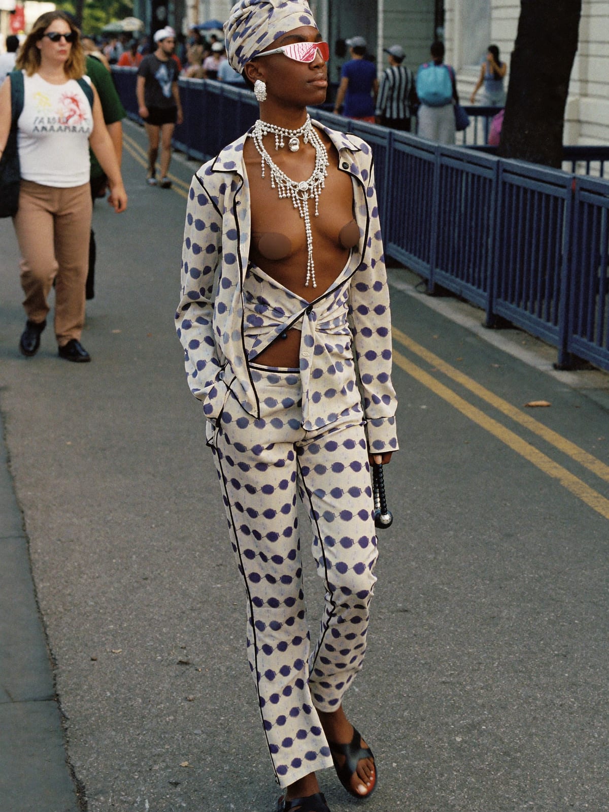 Afro Print Statement outfit for Trinidad Carnival: printed co-ord set, open shirt or wrap top, leather sandals or slides