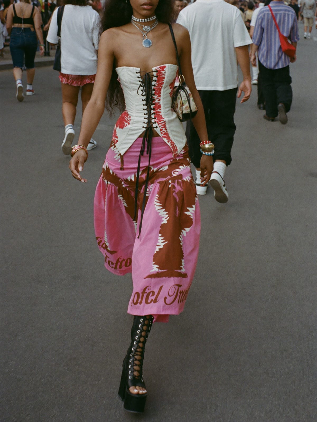 Corset Drama outfit for Trinidad Carnival: corset or bustier, tulle skirt or wide cargos, lace-up platform boots