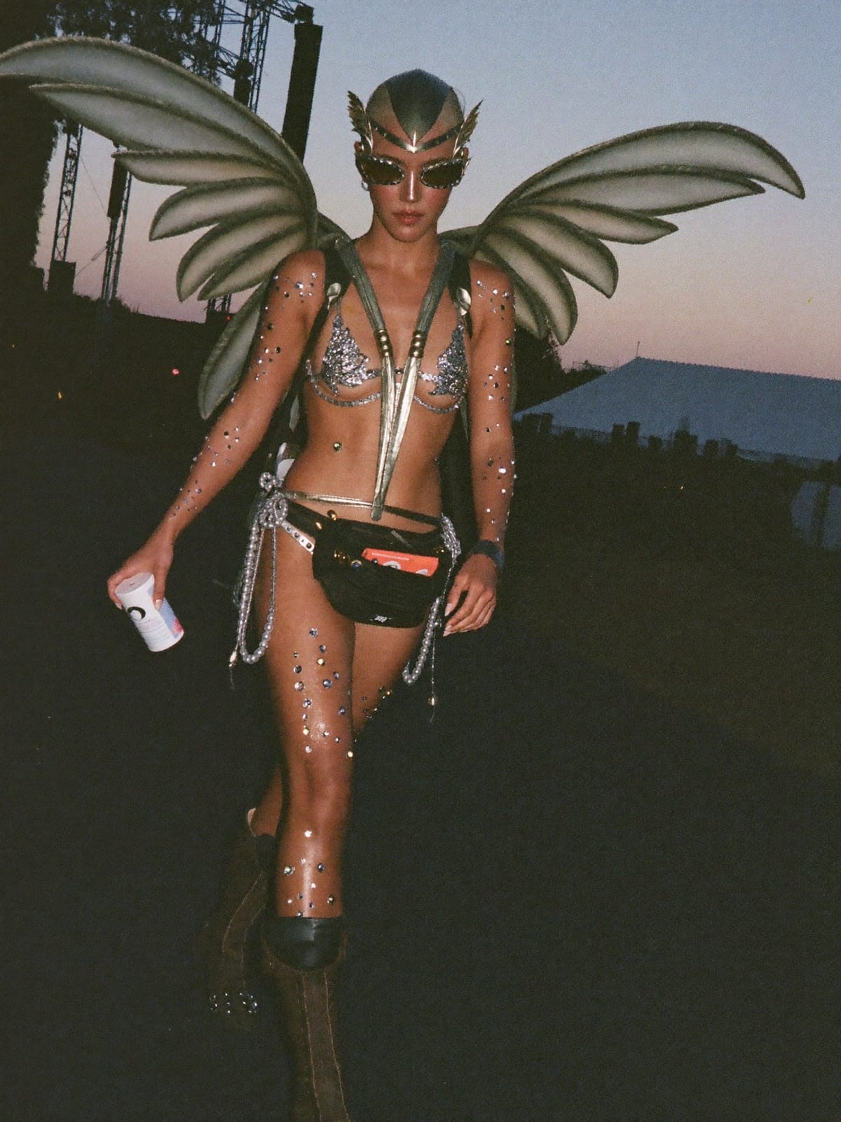 Full Costume outfit for UNTOLD: full themed costume or wings, body gems, glitter and paint, boots you can walk kilometres in