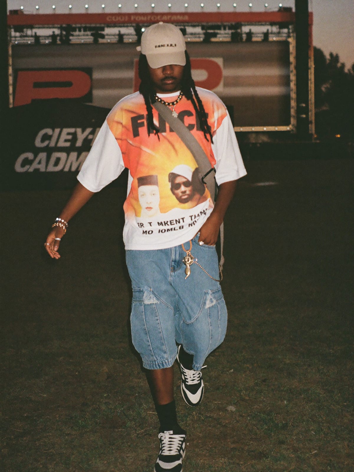 Street Heat outfit for UNTOLD: oversized graphic tee or jersey, baggy denim or cargo shorts, statement sneakers
