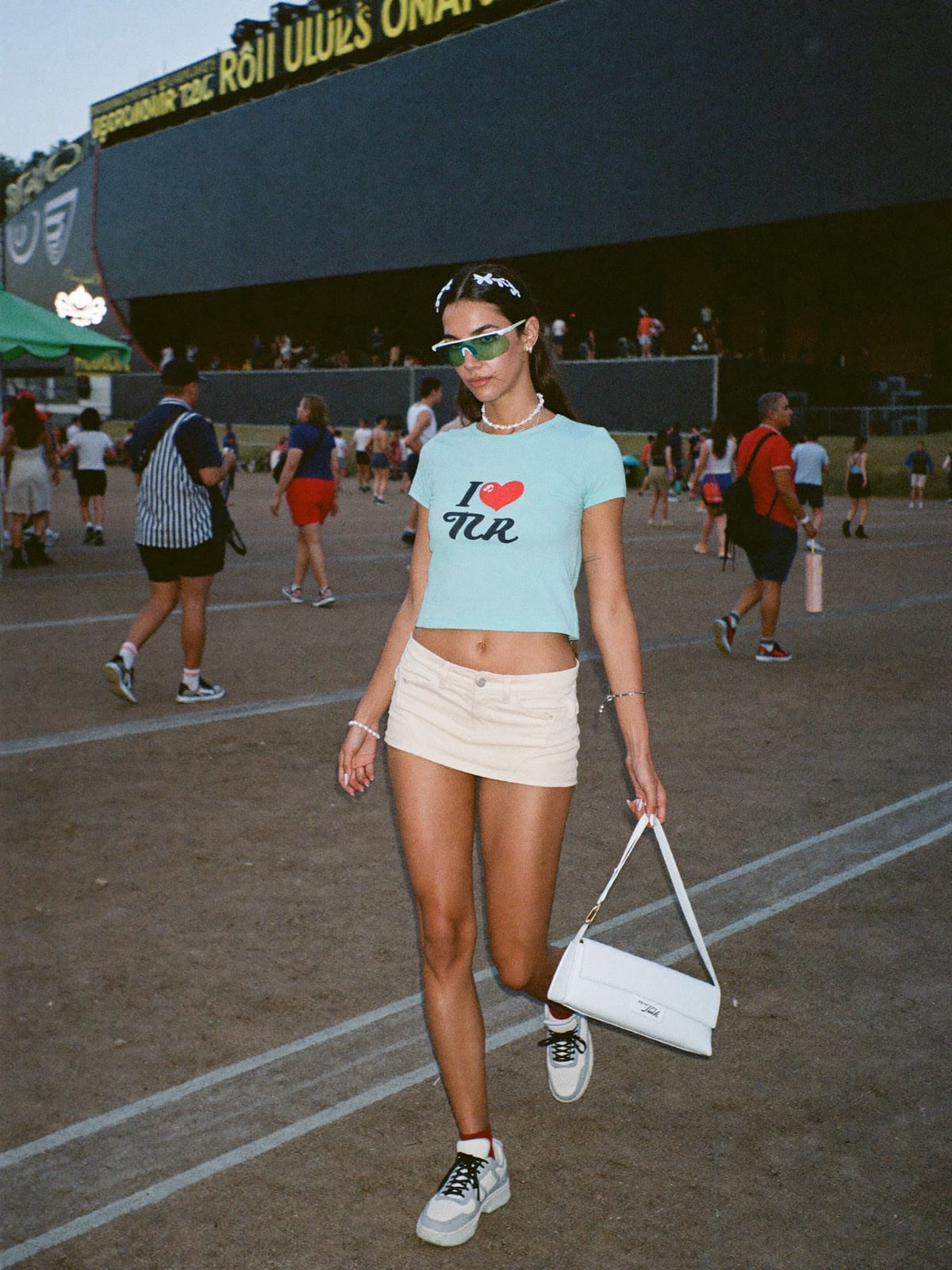 Y2K Revival outfit for UNTOLD: baby tee or halter top, low-rise cargo or micro mini, chunky retro trainers