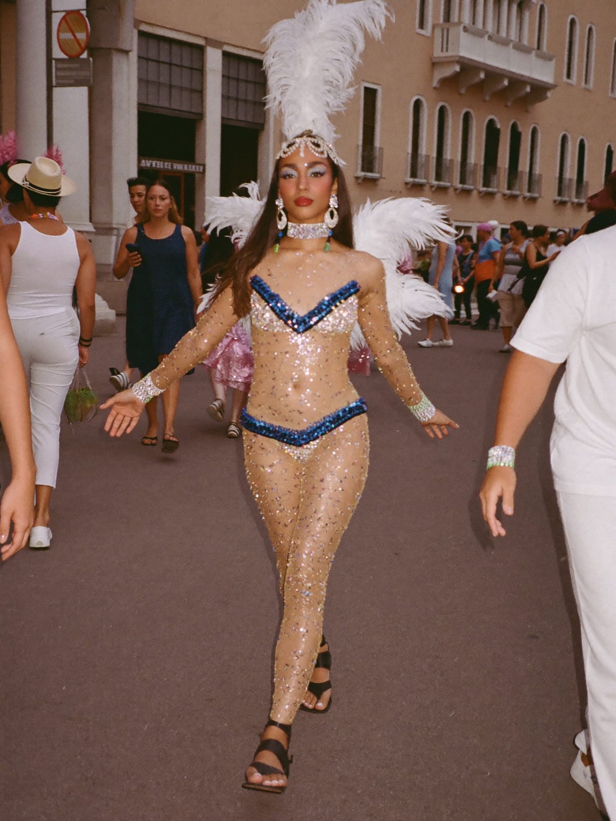 Carnival Feathers outfit for Venice Carnival: feather headpiece and wings, sequin bodysuit, body gems and glitter