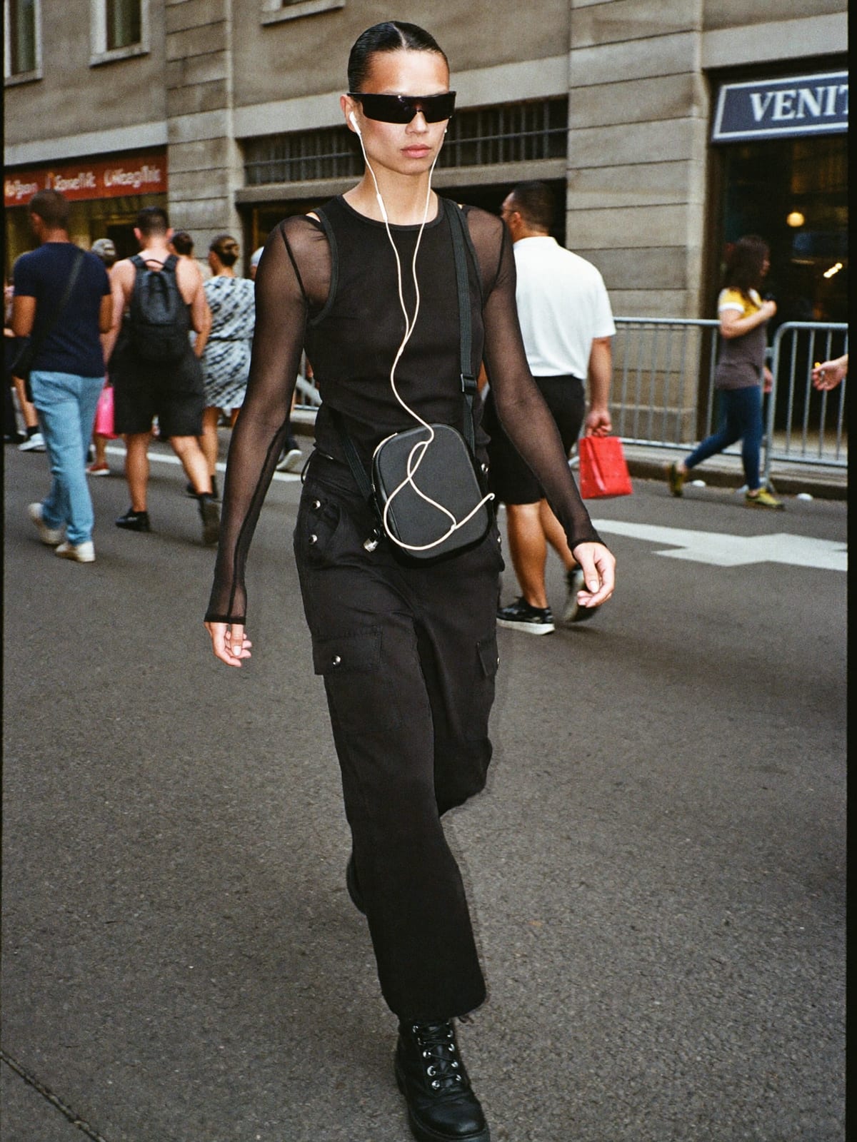 All-Black Techno outfit for Venice Carnival: black tank or mesh long sleeve, black cargo trousers, black combat boots
