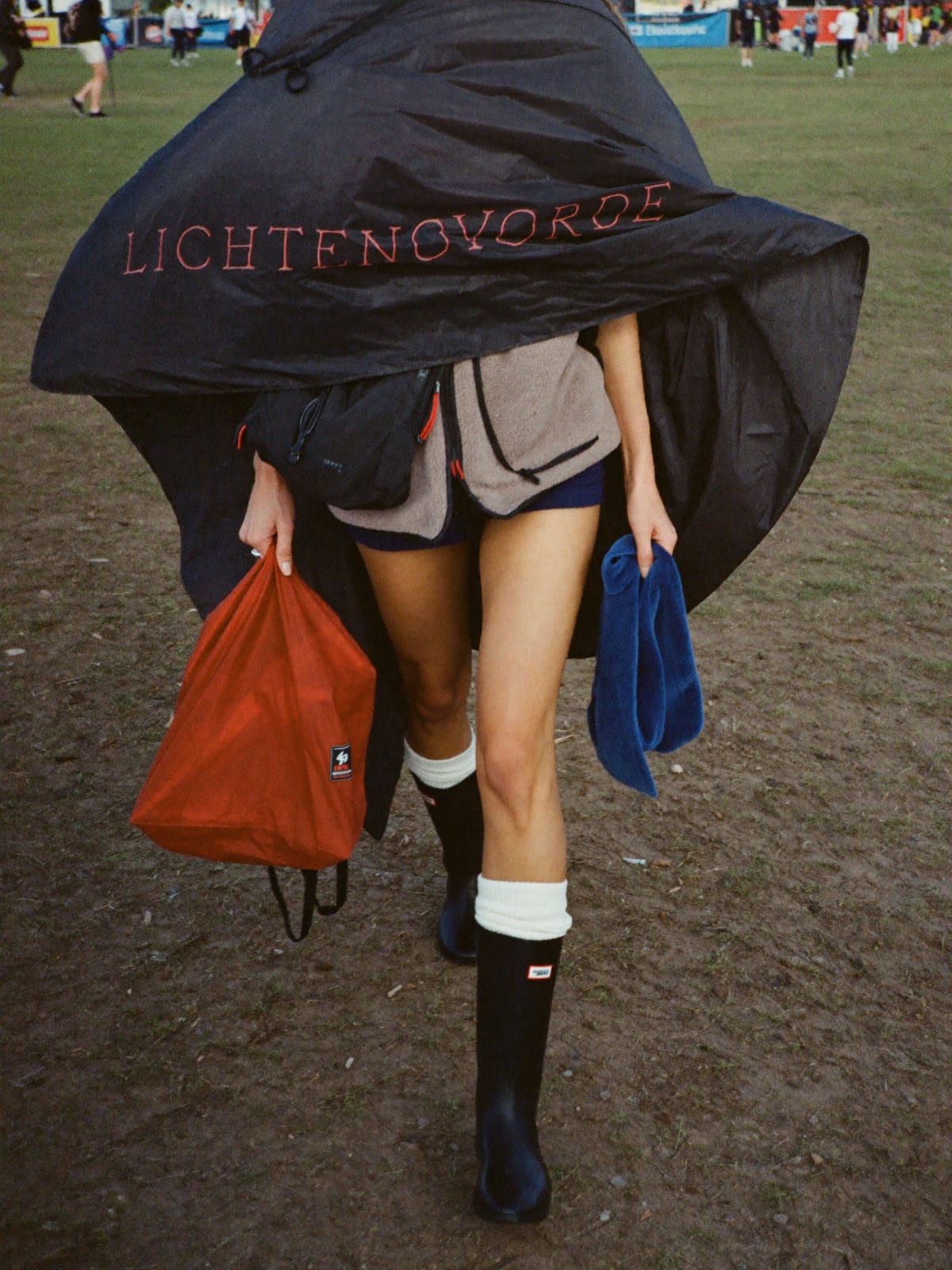 Mud-Proof Practical outfit for Zwarte Cross: waterproof poncho, wellington boots with thick socks, fleece mid-layer